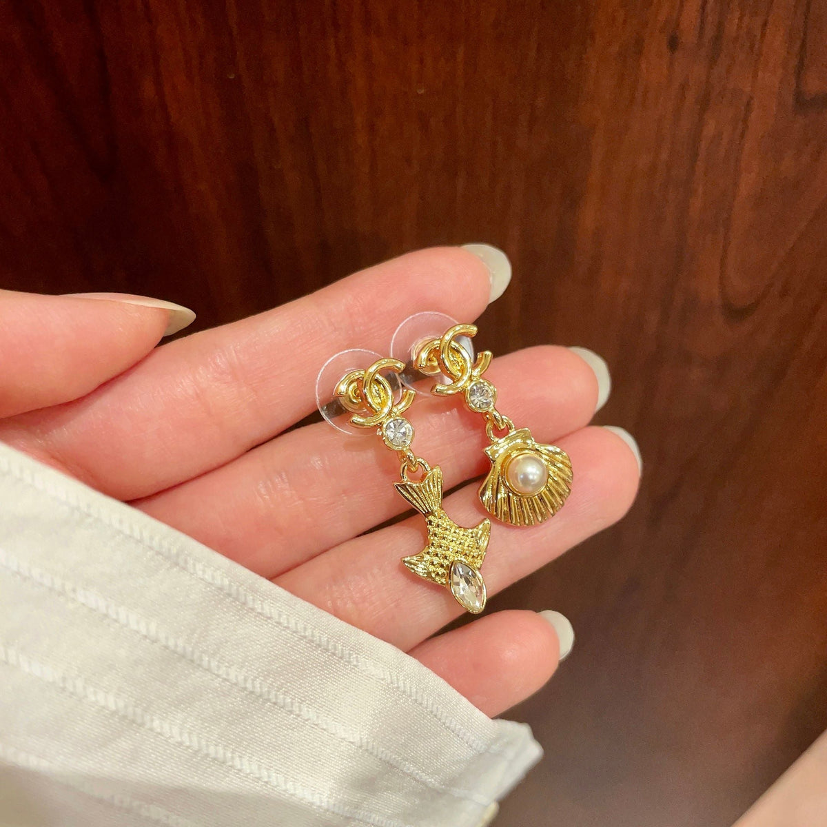 Martin Graham earrings in polished metal-tone – side detail