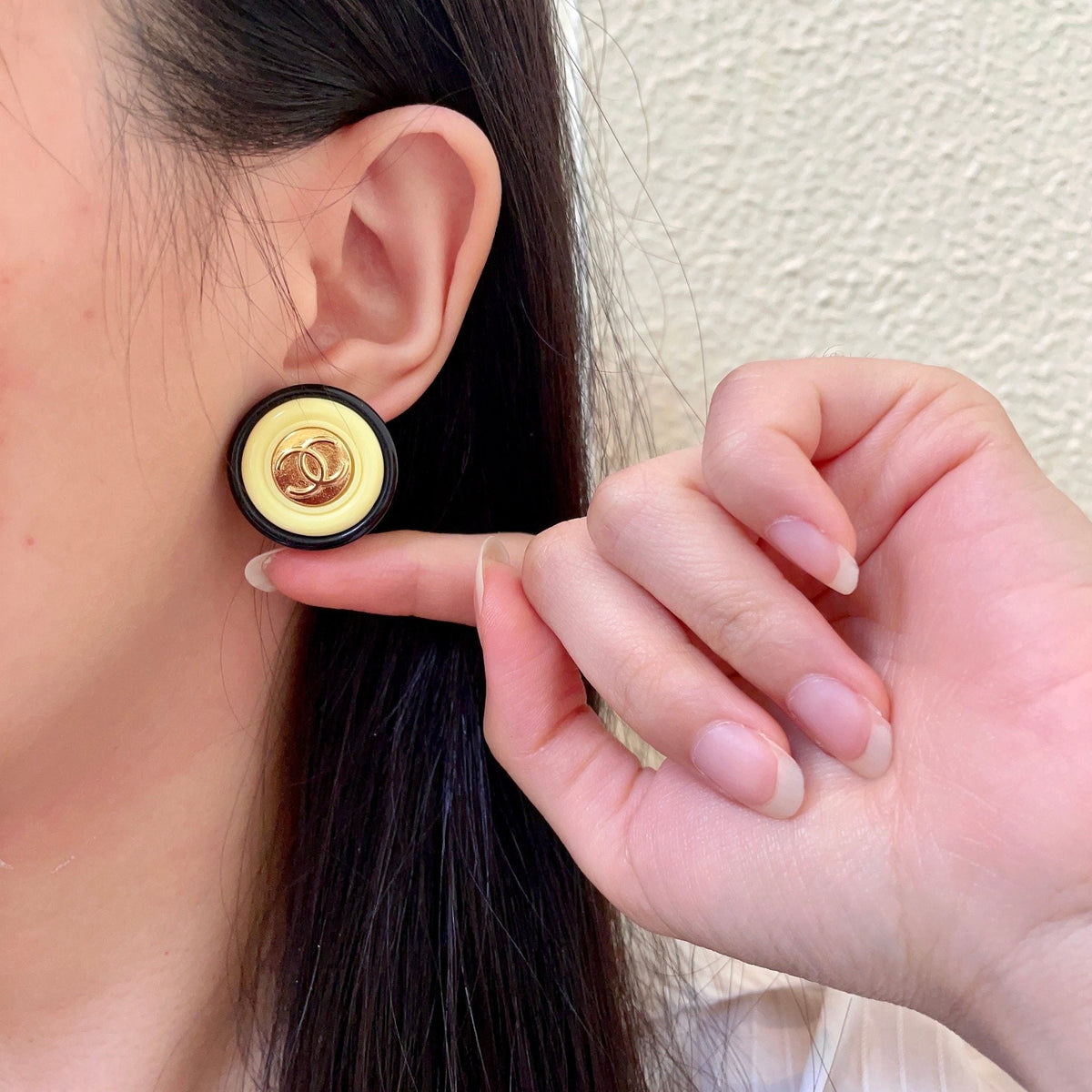 Martin Graham stud earrings in polished metal-tone – front product view