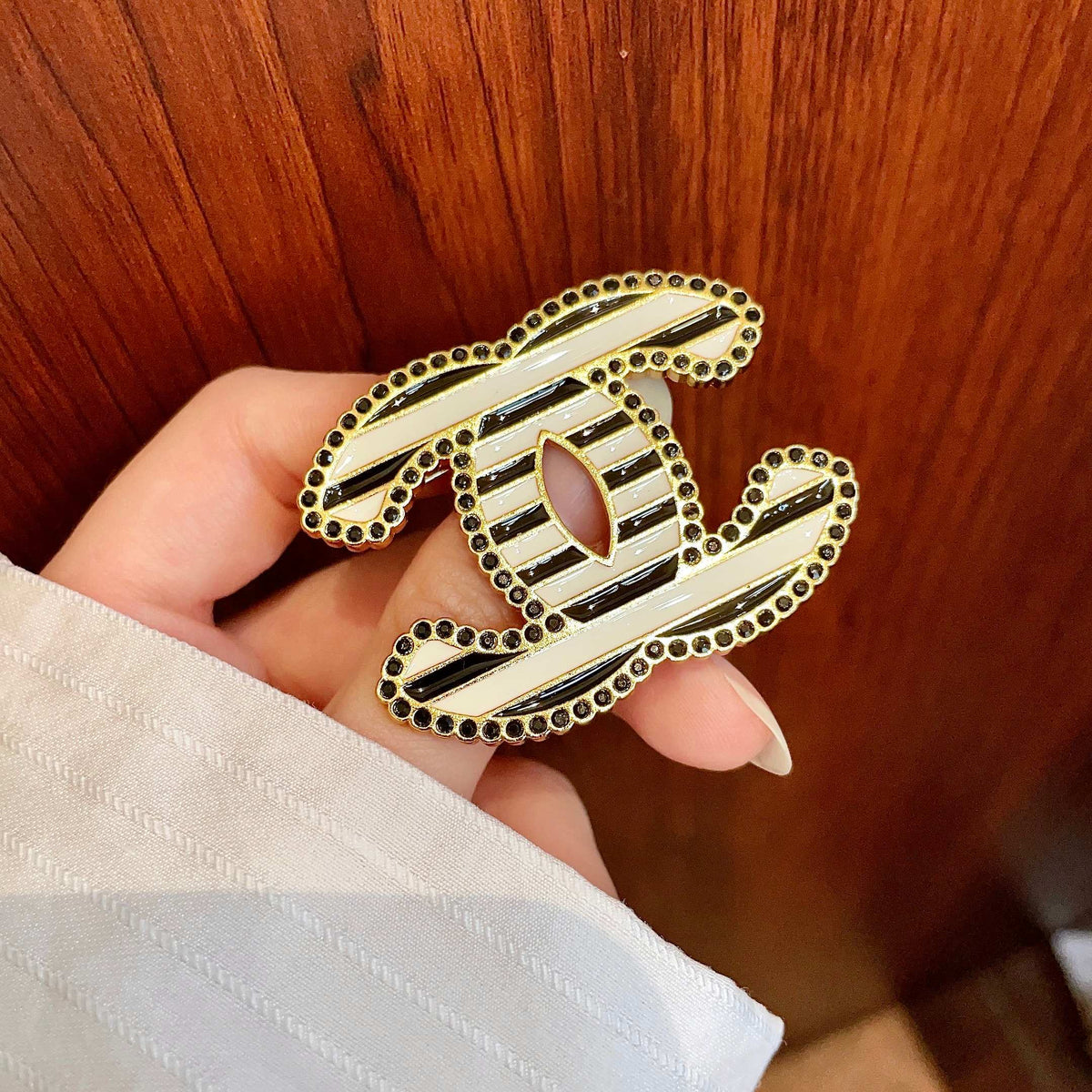 Martin Graham brooch in polished metal-tone – detail view
