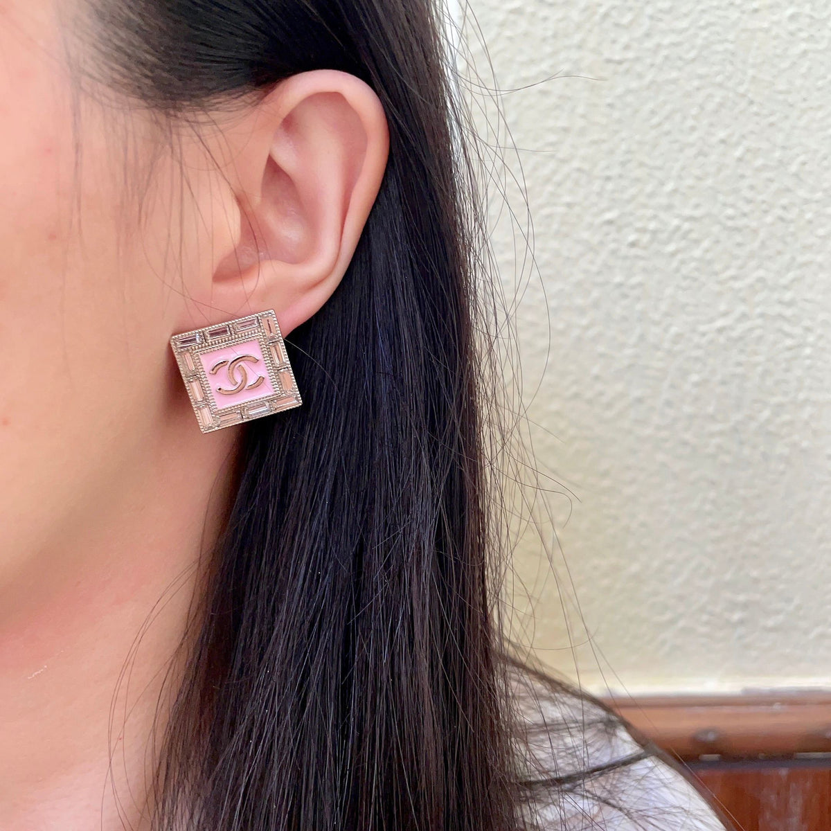 Martin Graham stud earrings in polished metal-tone – detail view