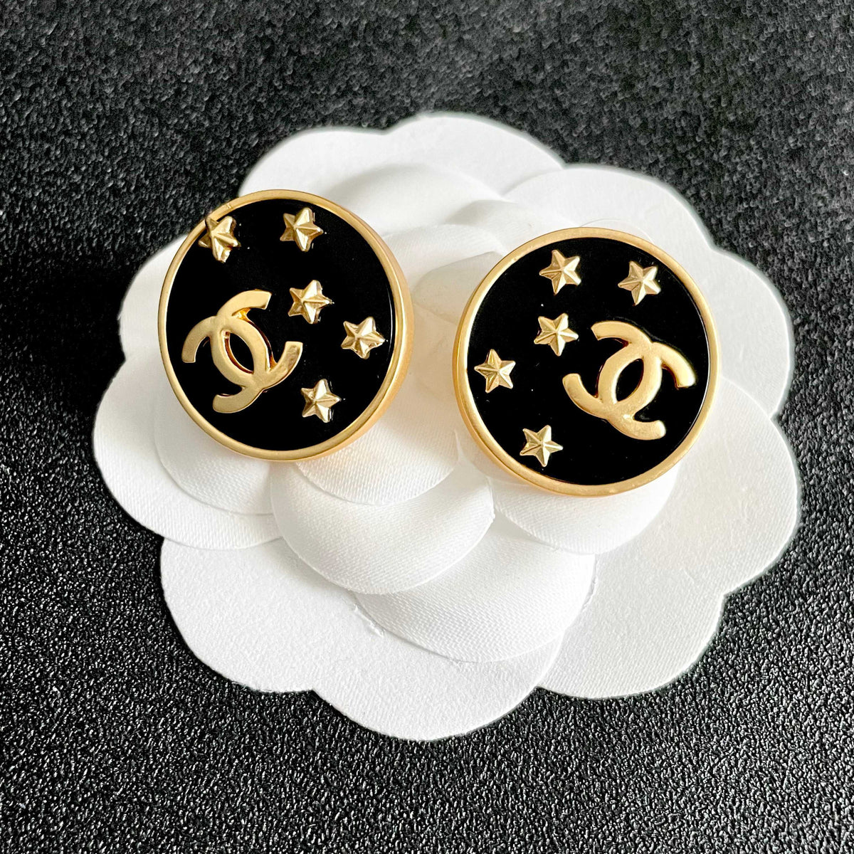 Martin Graham stud earrings in polished metal-tone – front product view