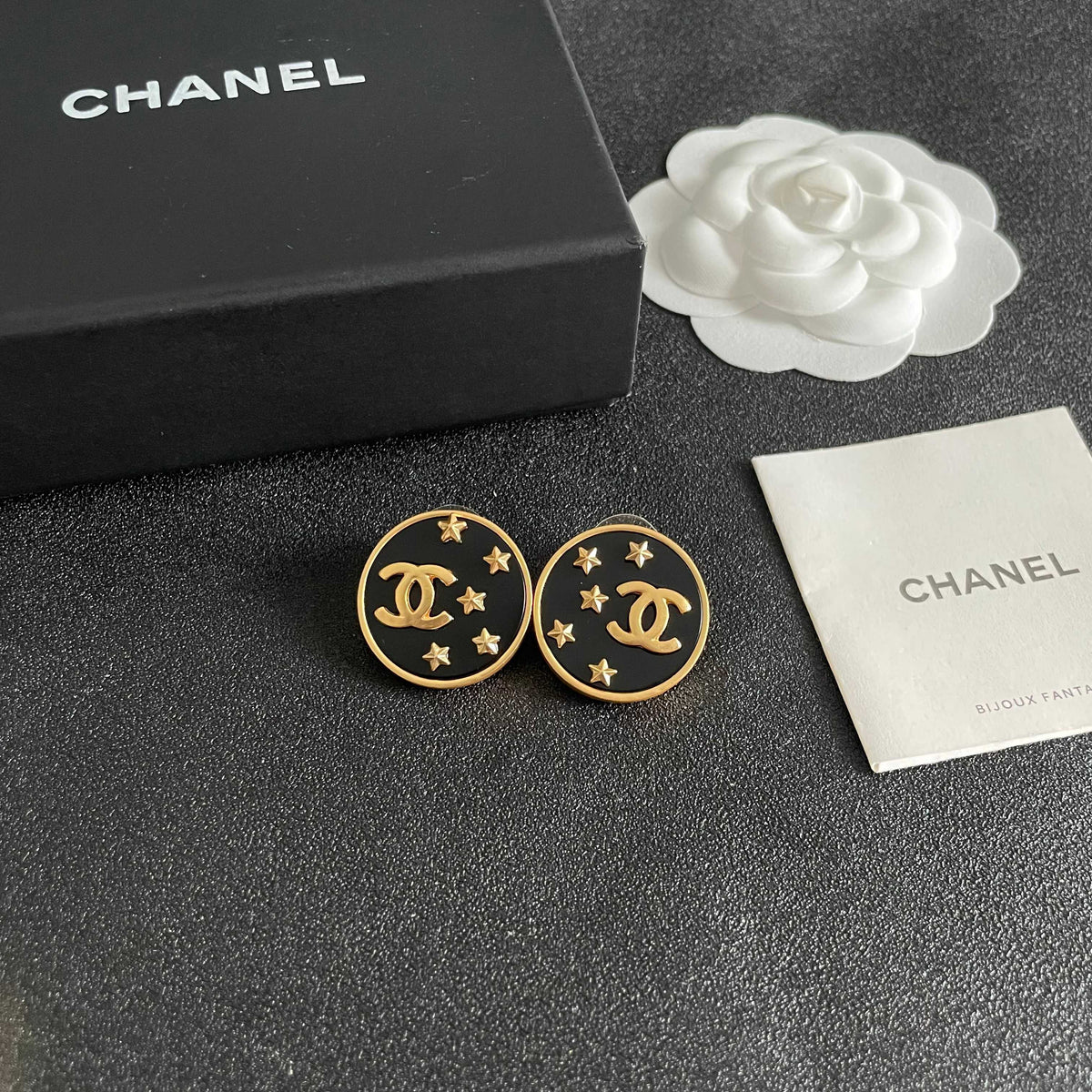 Martin Graham stud earrings in polished metal-tone – styled product view