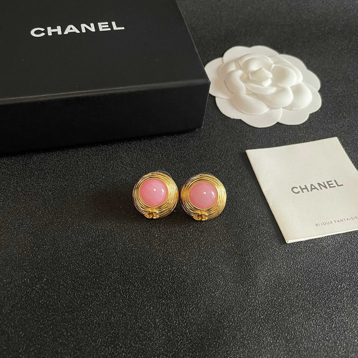 Martin Graham stud earrings in polished metal-tone – styled product view