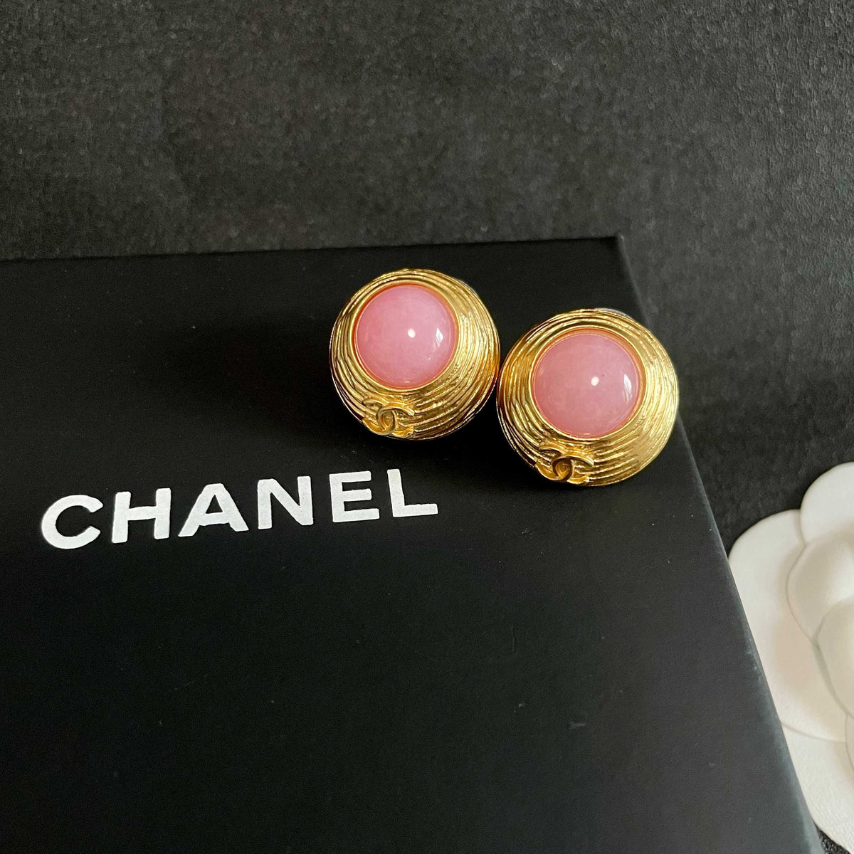 Martin Graham stud earrings in polished metal-tone – detail view