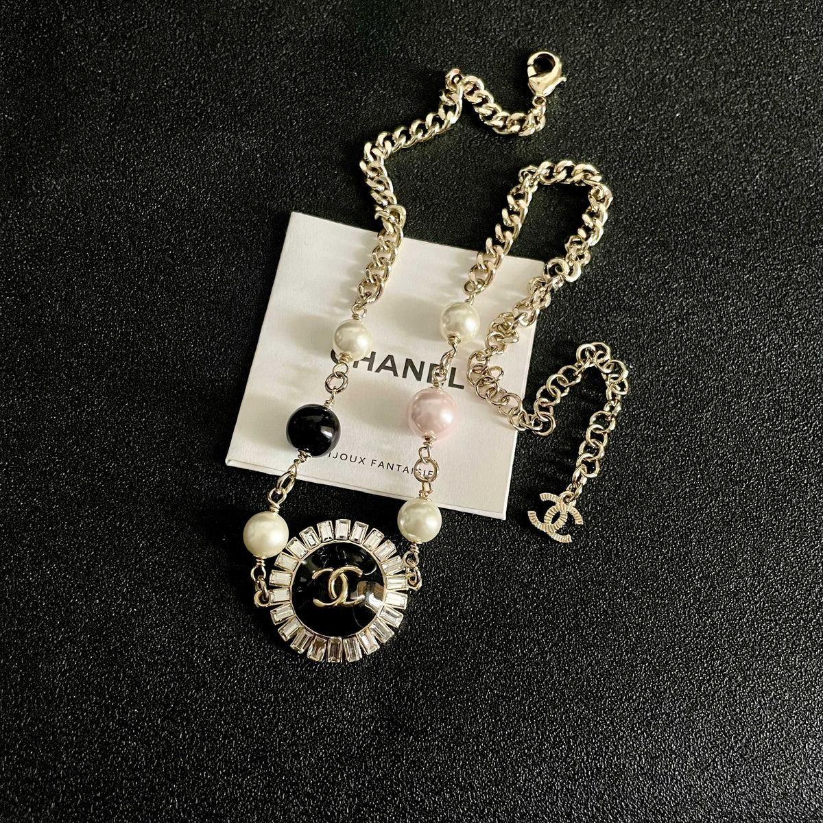 Martin Graham pendant necklace in polished metal-tone – detail view