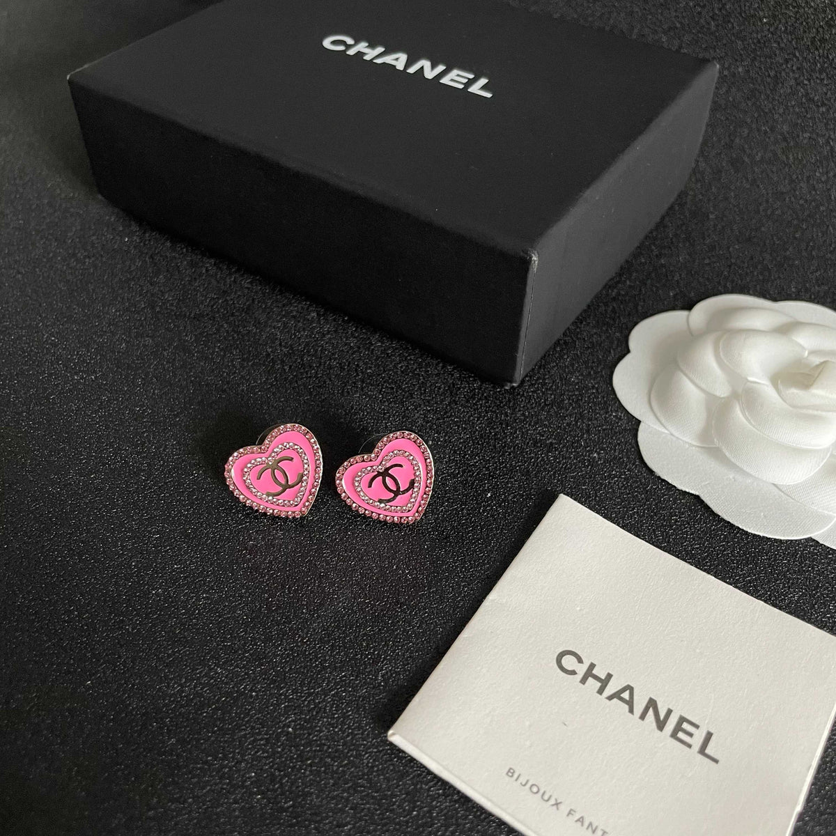Martin Graham stud earrings in polished metal-tone – close-up detail