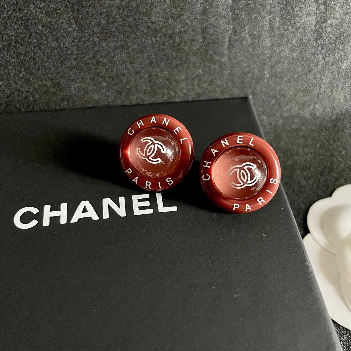 Martin Graham stud earrings in polished metal-tone – detail view