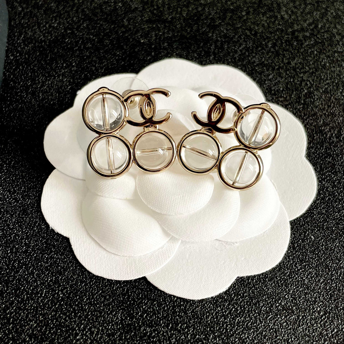 Martin Graham stud earrings in polished metal-tone – front product view