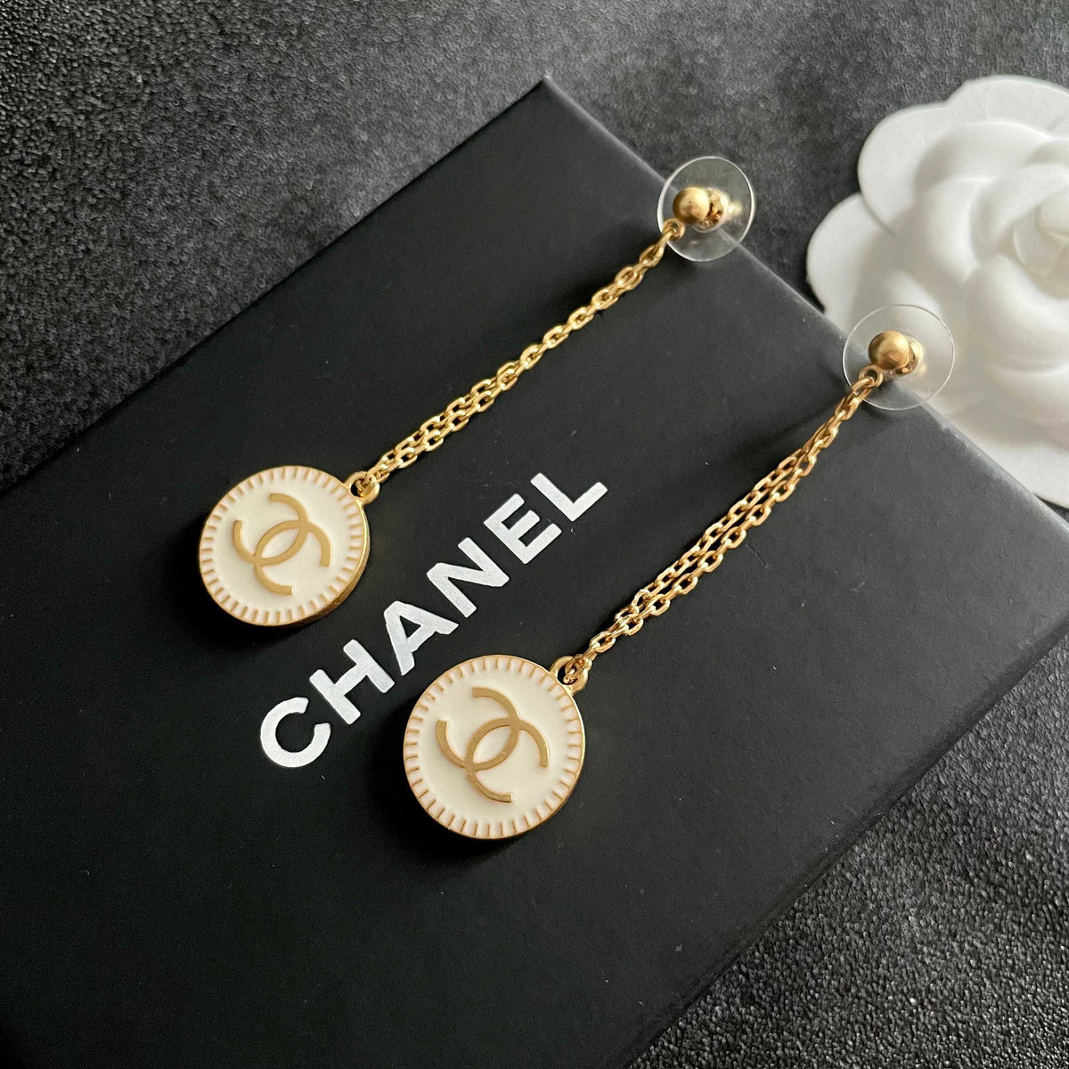 Martin Graham earrings in polished metal-tone – front product view