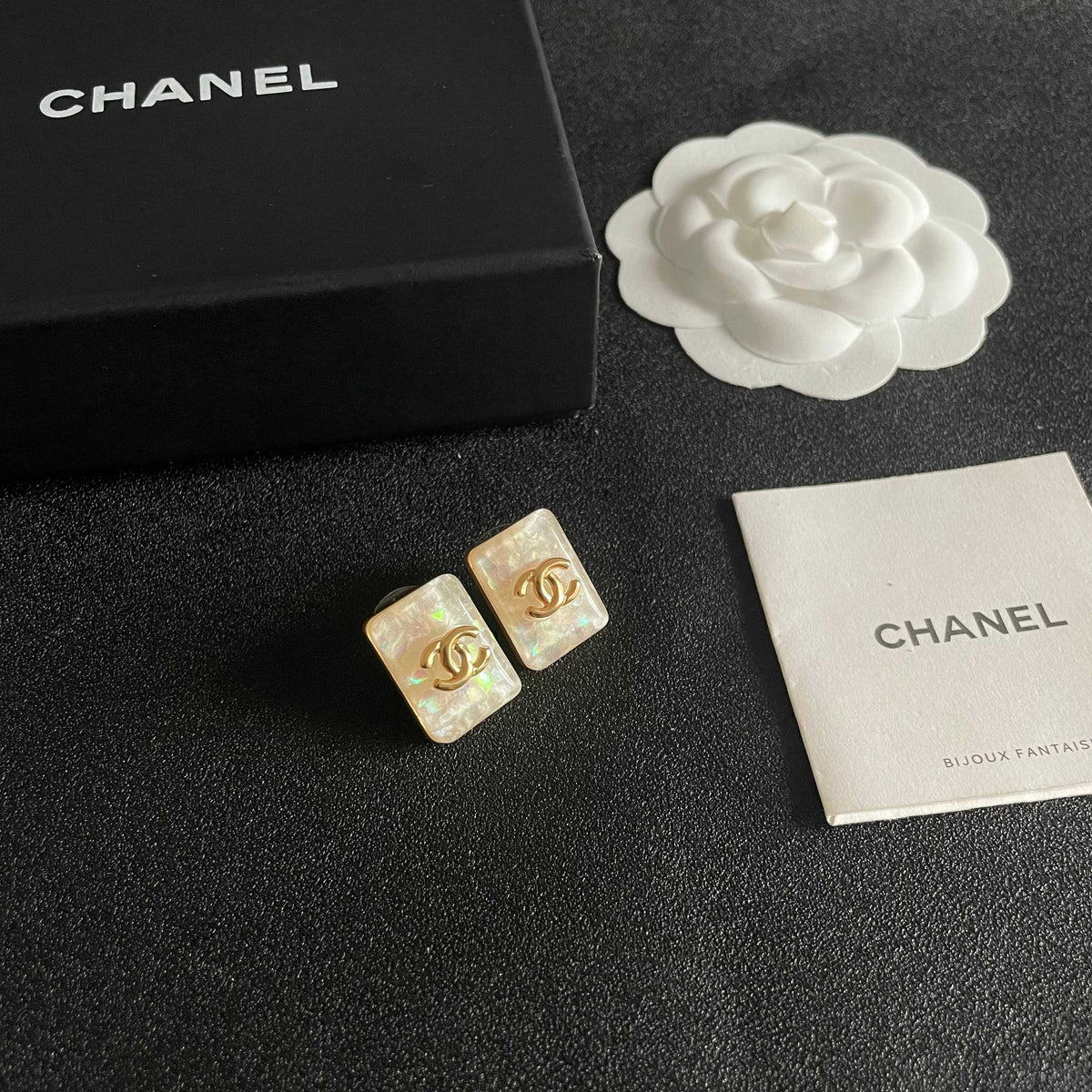 Martin Graham stud earrings in polished metal-tone – styled product view