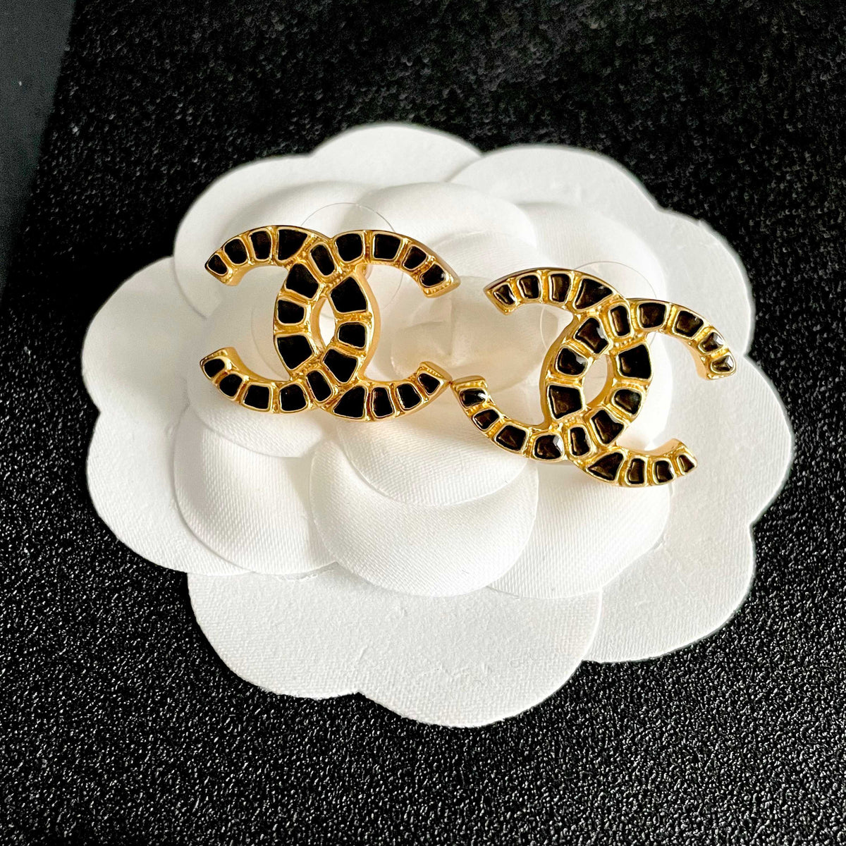 Martin Graham stud earrings in polished metal-tone – front product view