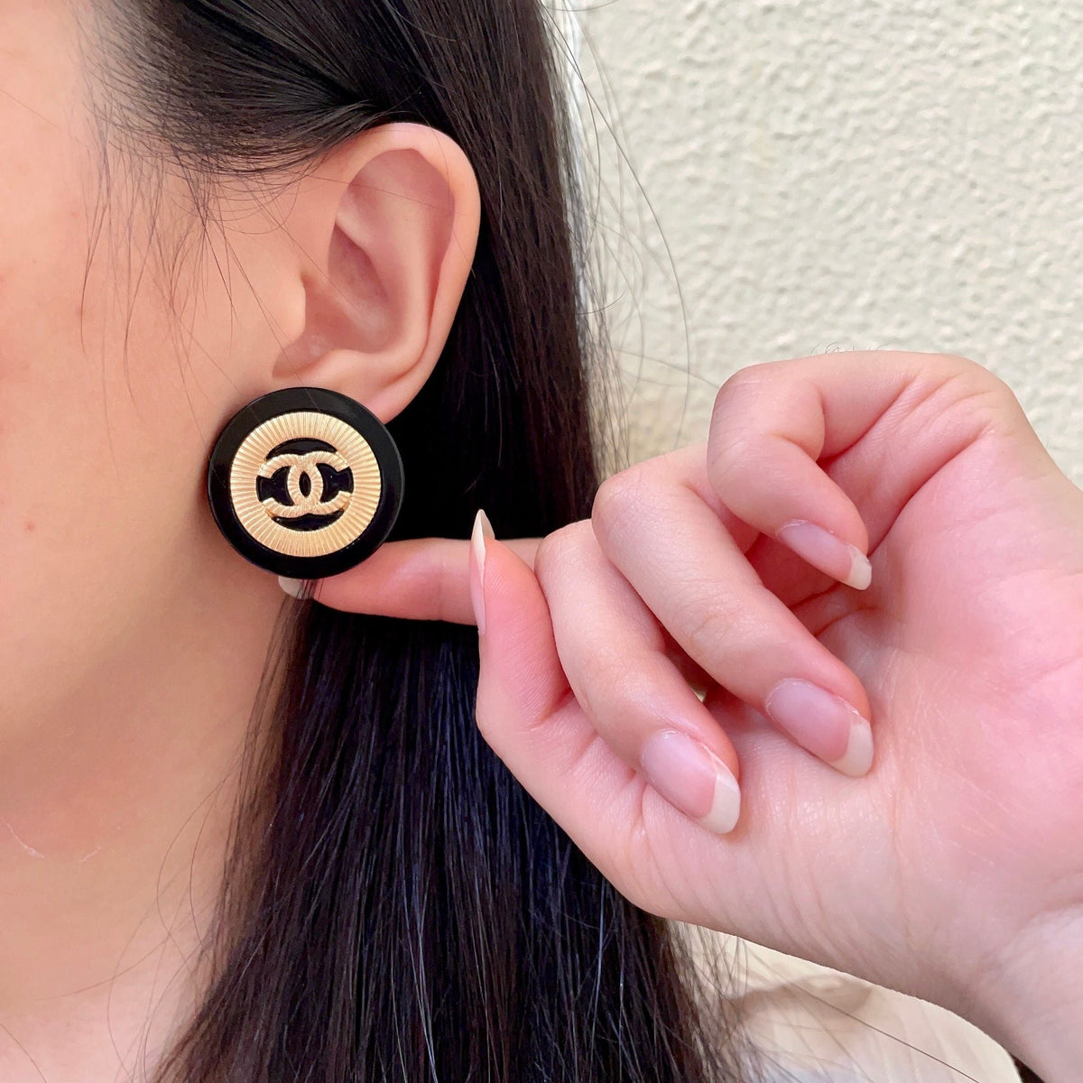 Martin Graham stud earrings in polished metal-tone – front product view
