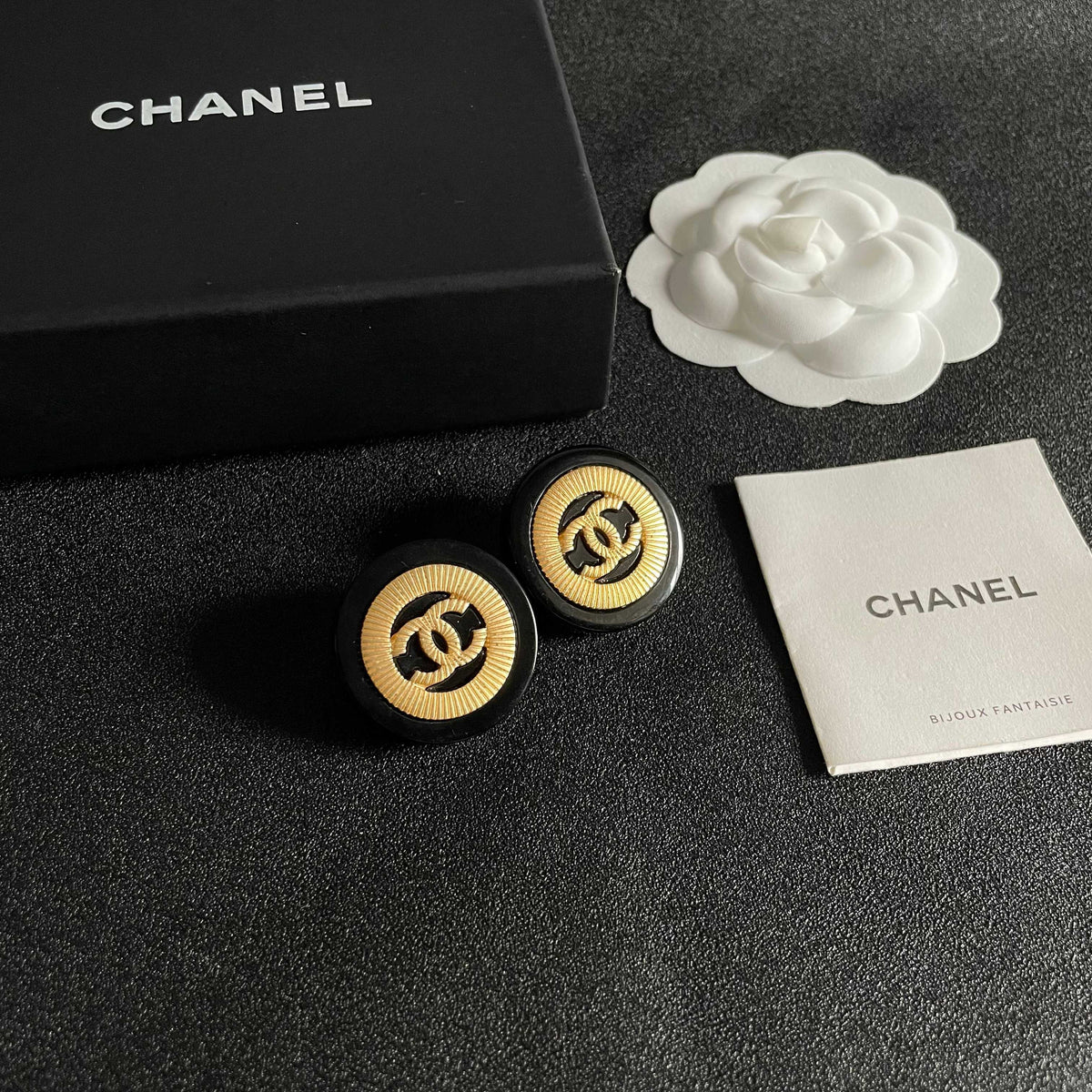 Martin Graham stud earrings in polished metal-tone – styled product view