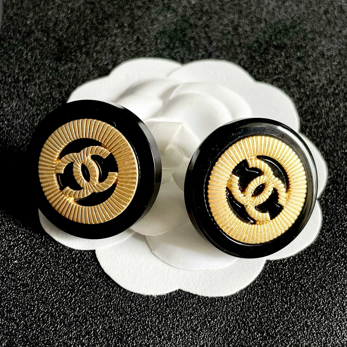 Martin Graham stud earrings in polished metal-tone – front product view
