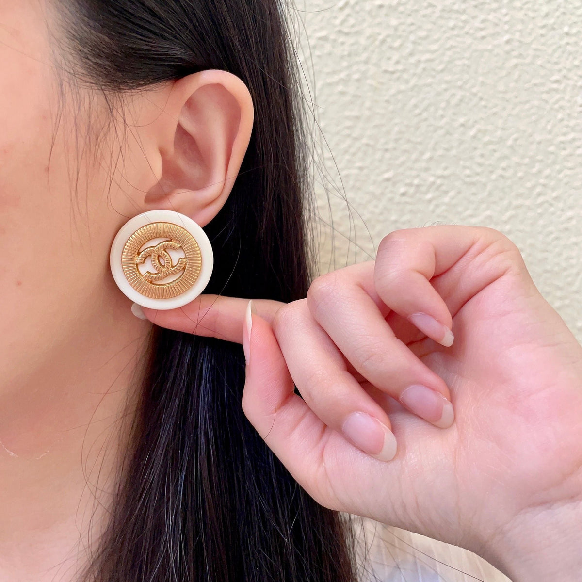 Martin Graham stud earrings in polished metal-tone – front product view