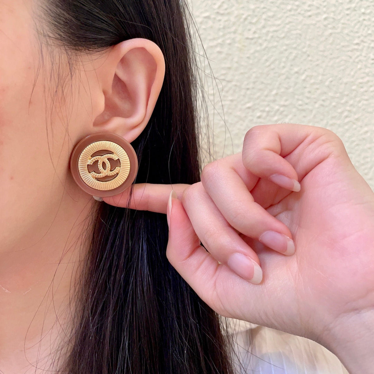Martin Graham stud earrings in polished metal-tone – front product view