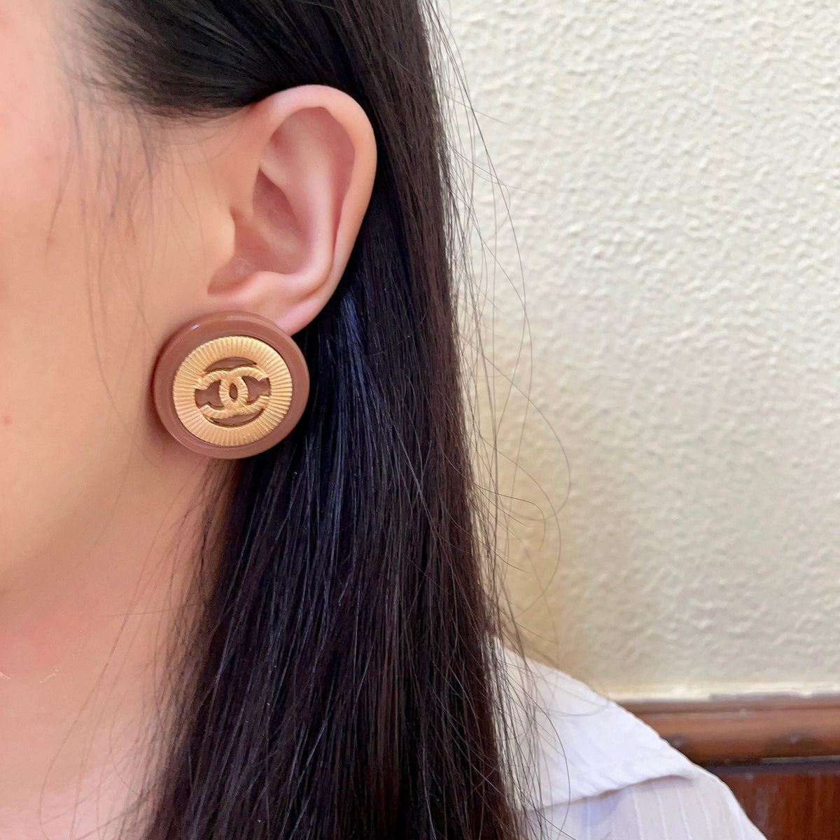 Martin Graham stud earrings in polished metal-tone – detail view