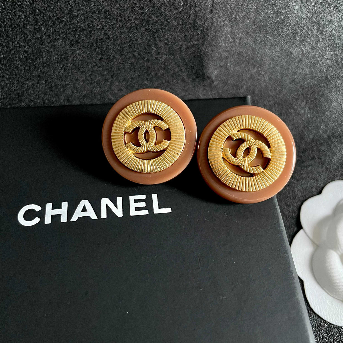 Martin Graham stud earrings in polished metal-tone – detail view