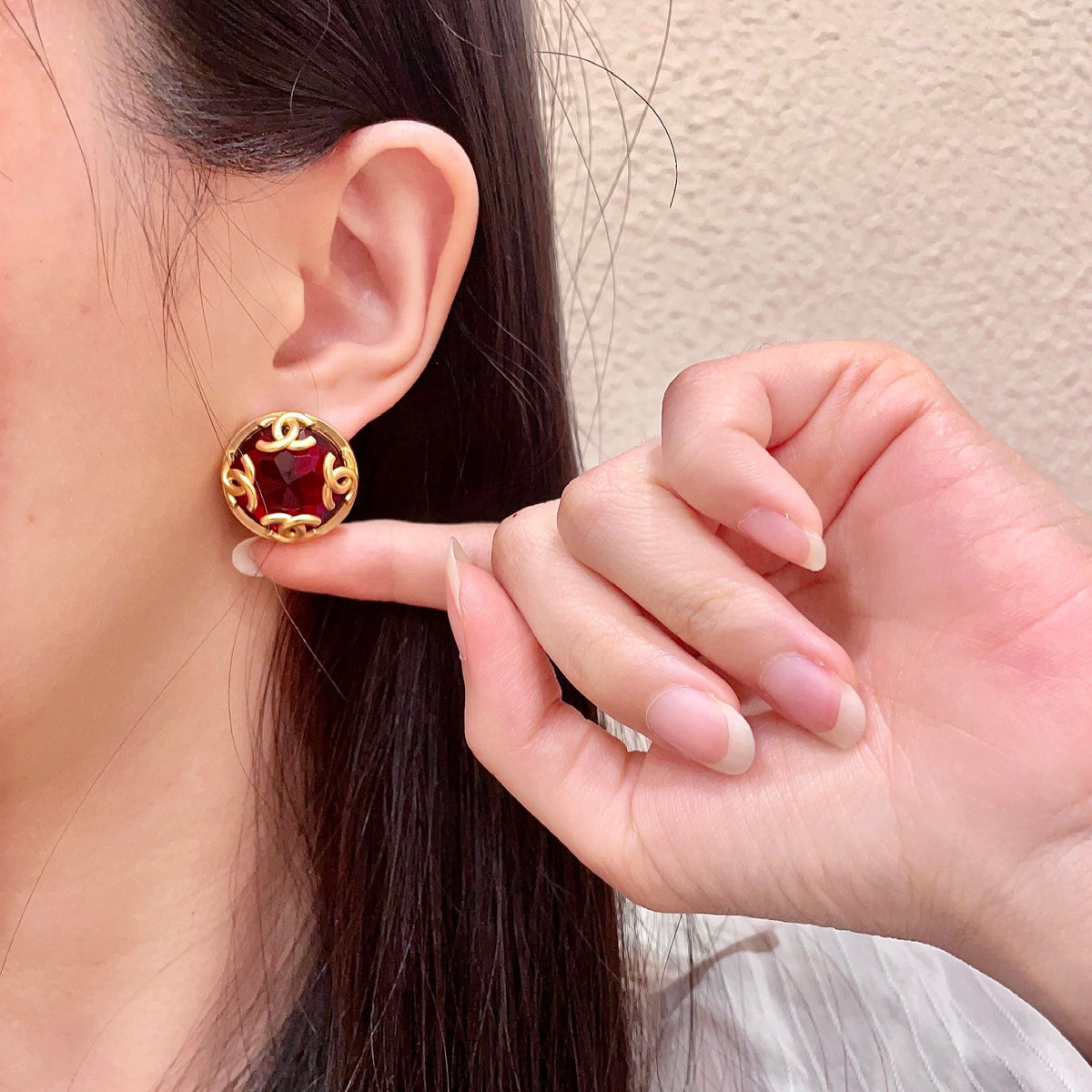 Martin Graham stud earrings in polished metal-tone – front product view