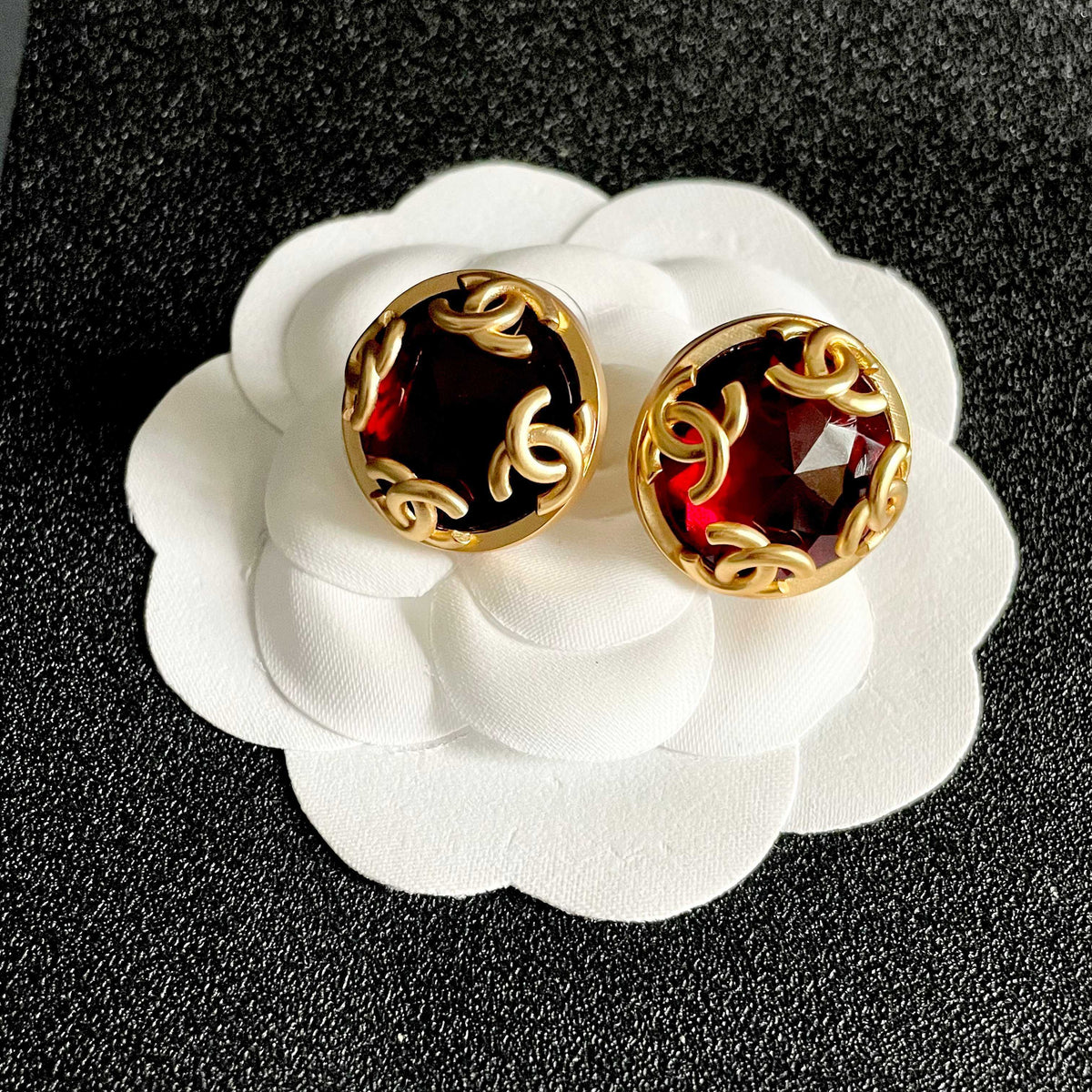 Martin Graham stud earrings in polished metal-tone – front product view