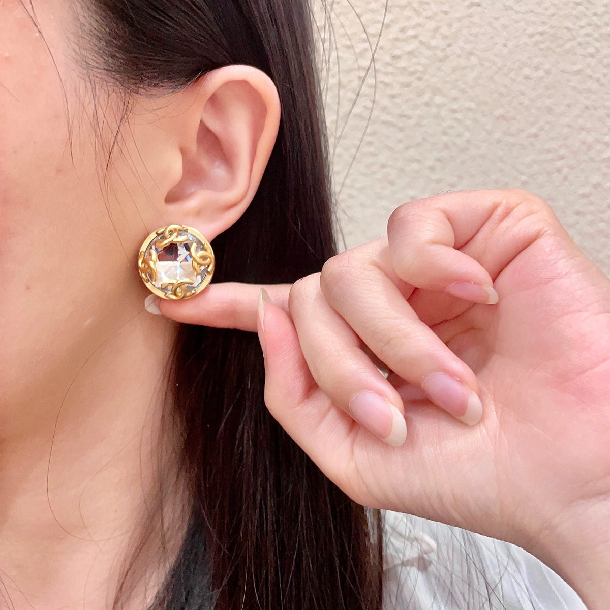 Martin Graham stud earrings in polished metal-tone – front product view