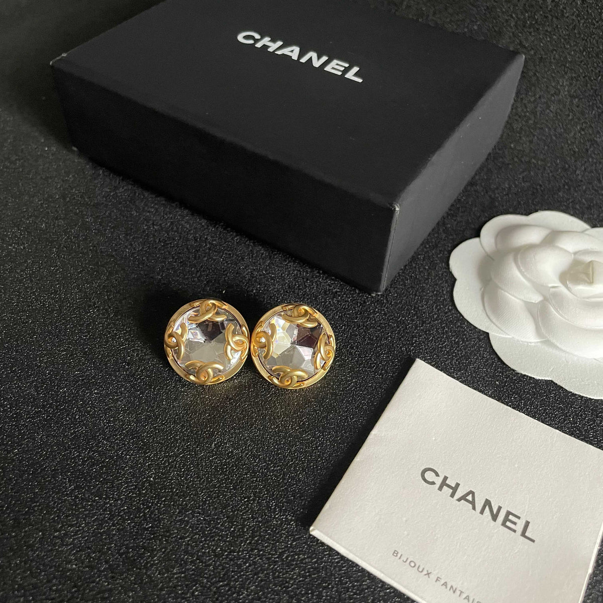 Martin Graham stud earrings in polished metal-tone – close-up detail