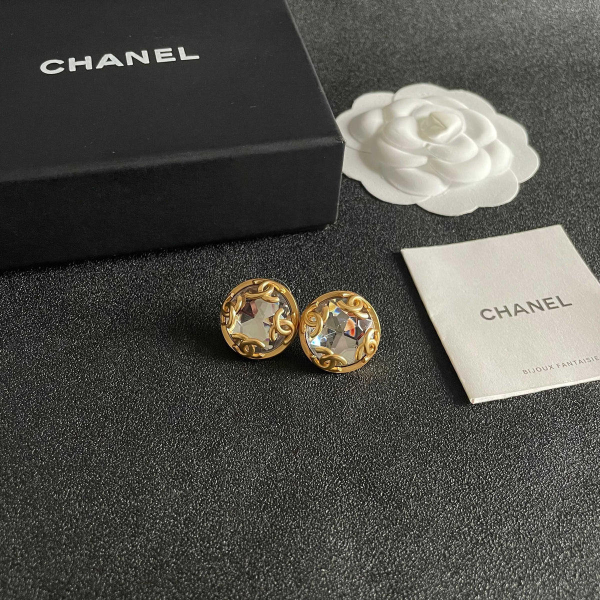 Martin Graham stud earrings in polished metal-tone – styled product view