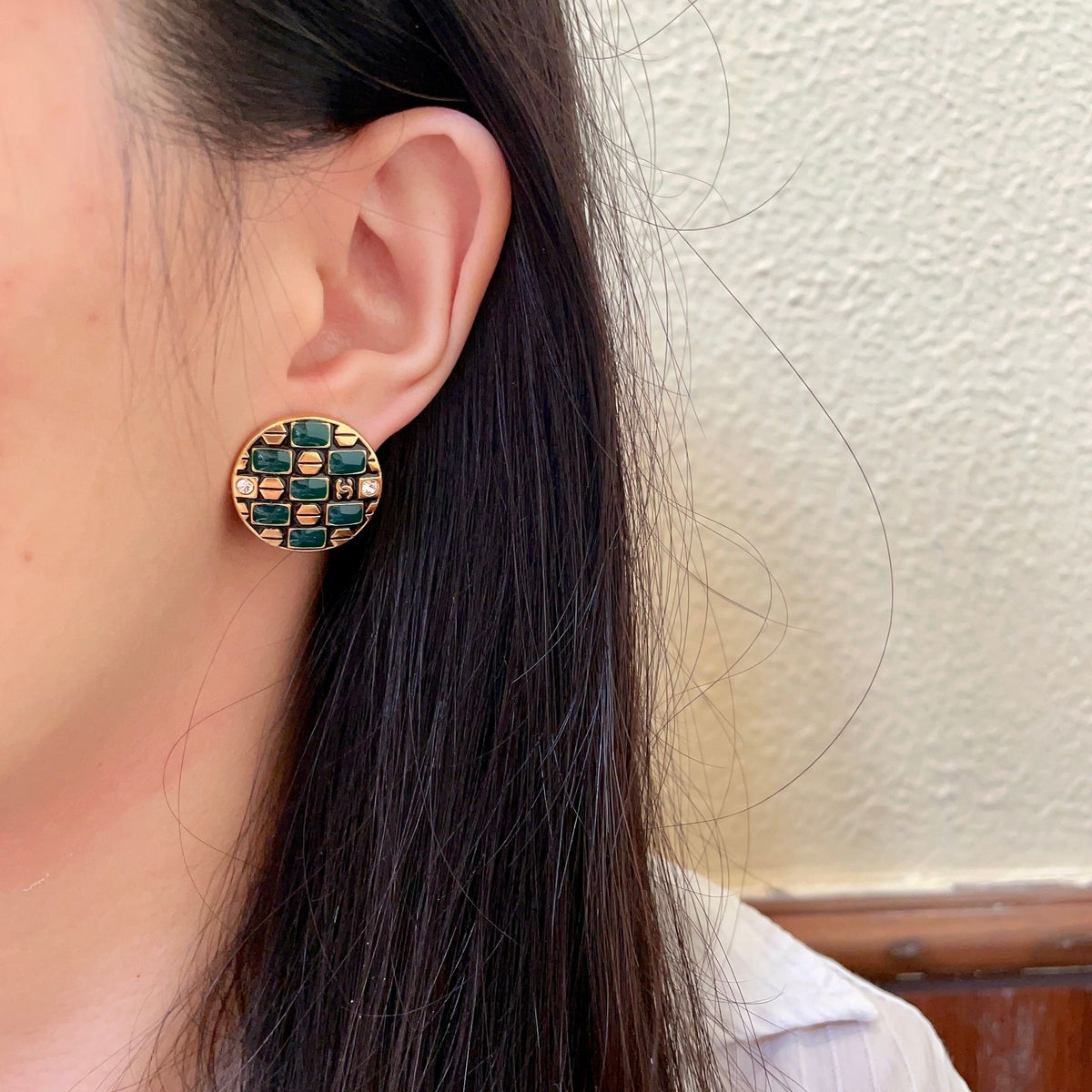 Martin Graham stud earrings in polished metal-tone – detail view