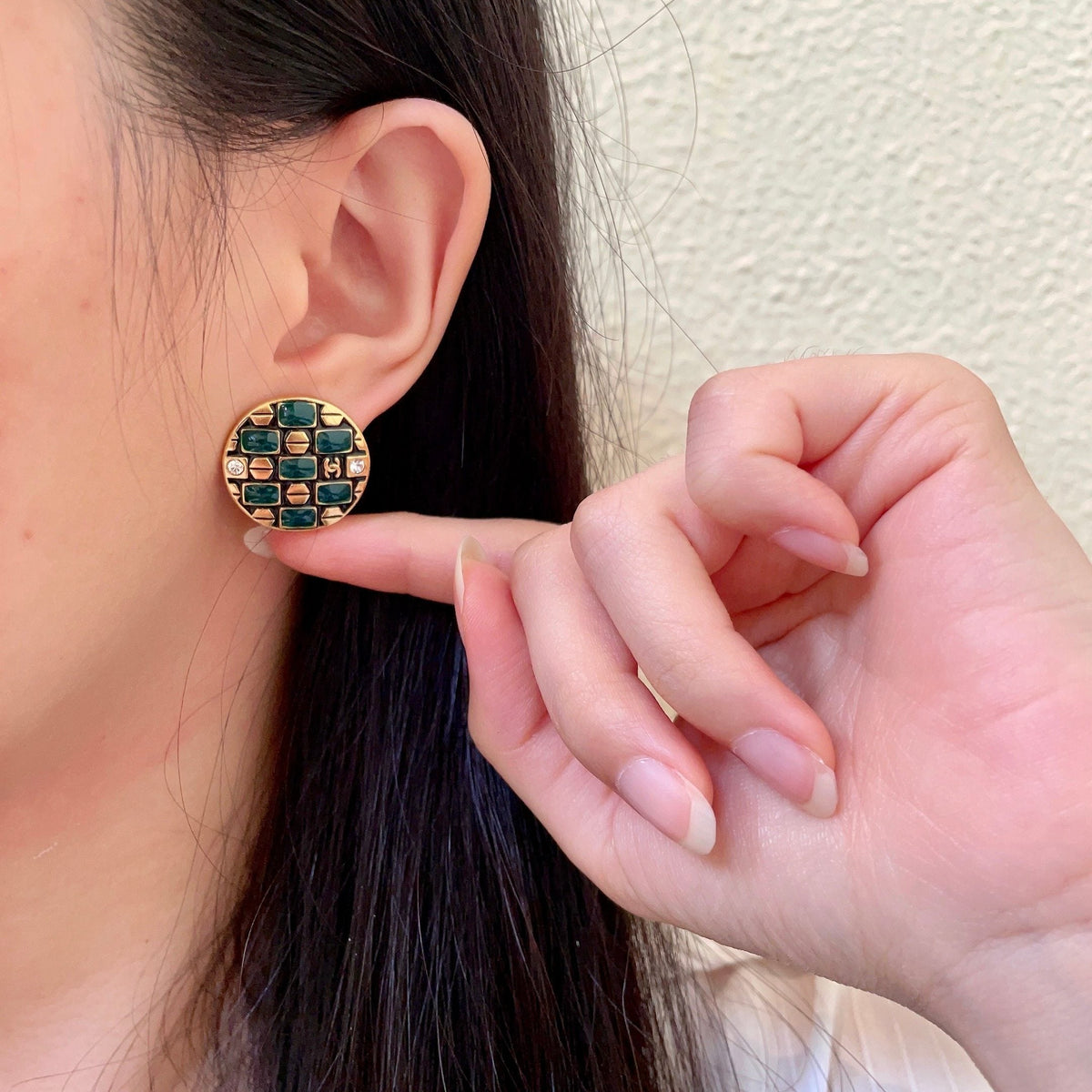 Martin Graham stud earrings in polished metal-tone – front product view