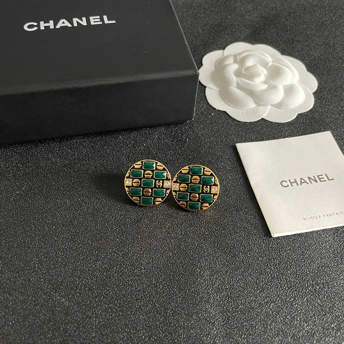Martin Graham stud earrings in polished metal-tone – styled product view