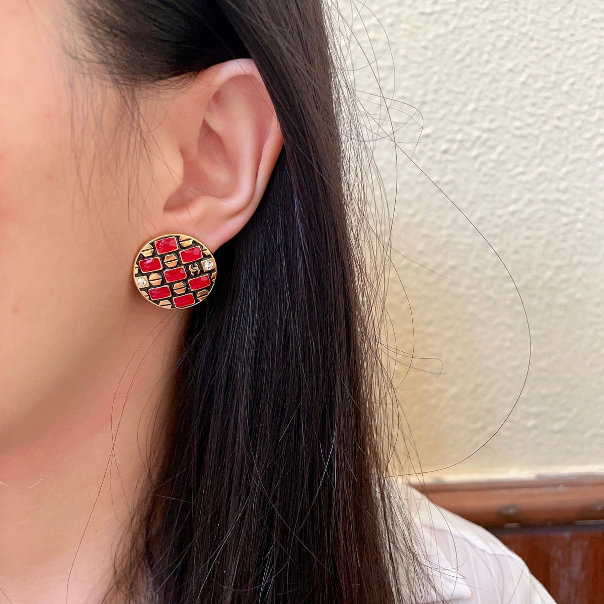 Martin Graham stud earrings in polished metal-tone – detail view
