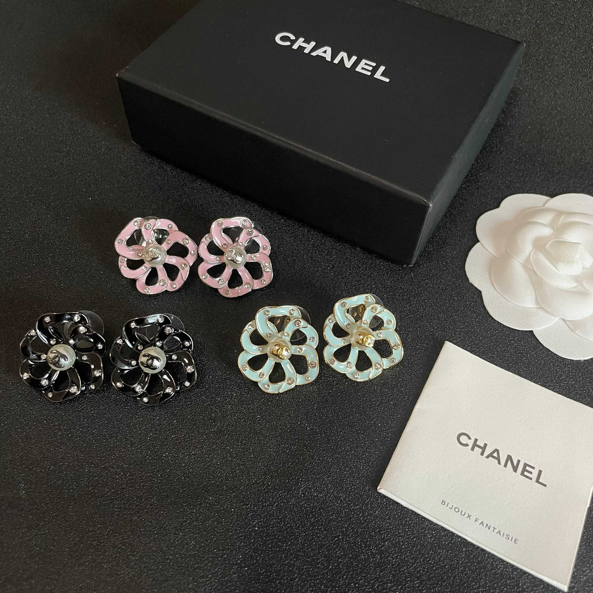 Martin Graham stud earrings in polished metal-tone – close-up detail