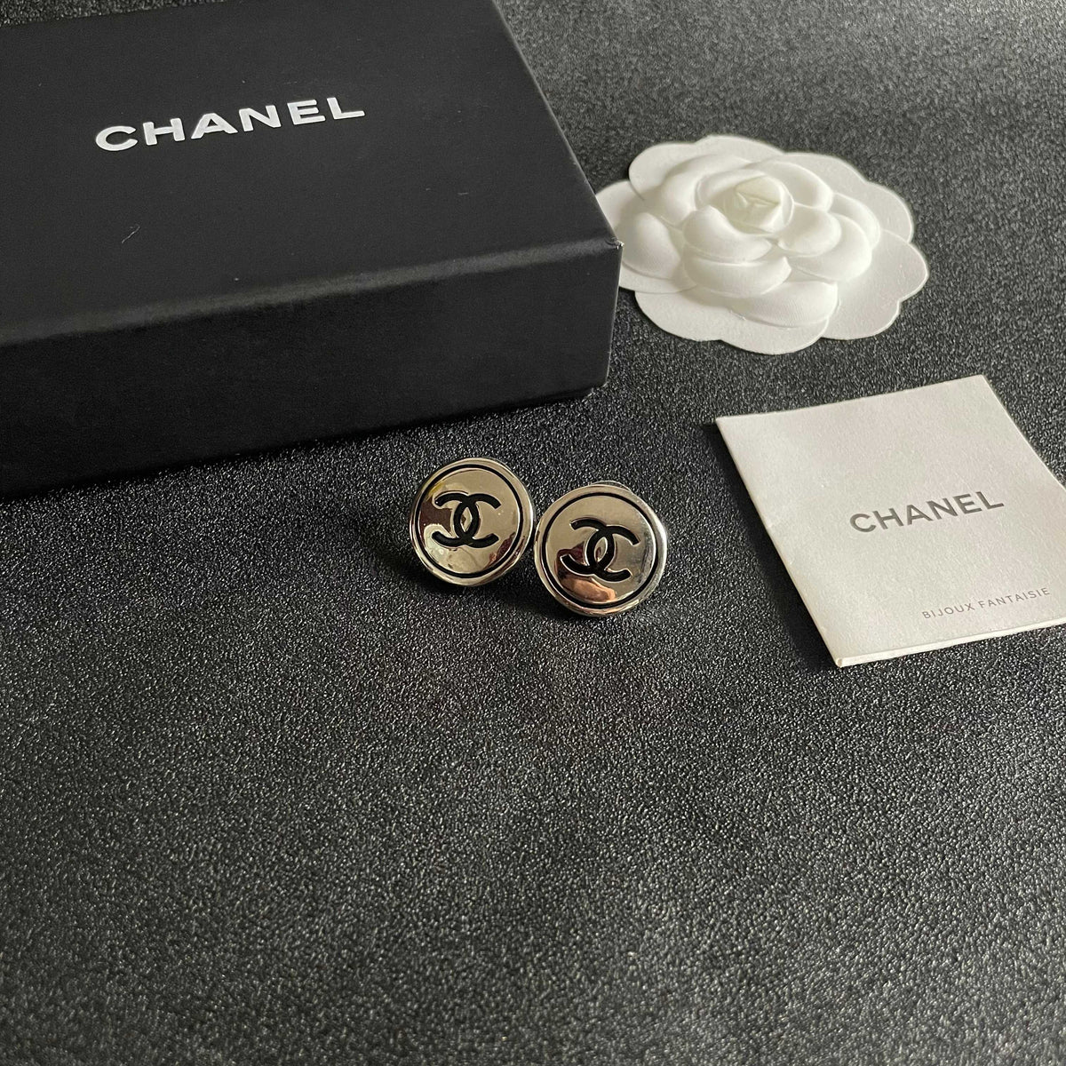Martin Graham stud earrings in polished metal-tone – styled product view