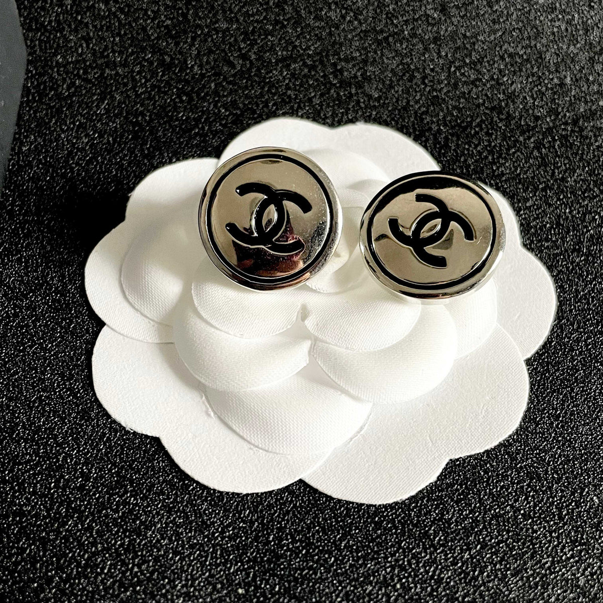 Martin Graham stud earrings in polished metal-tone – front product view