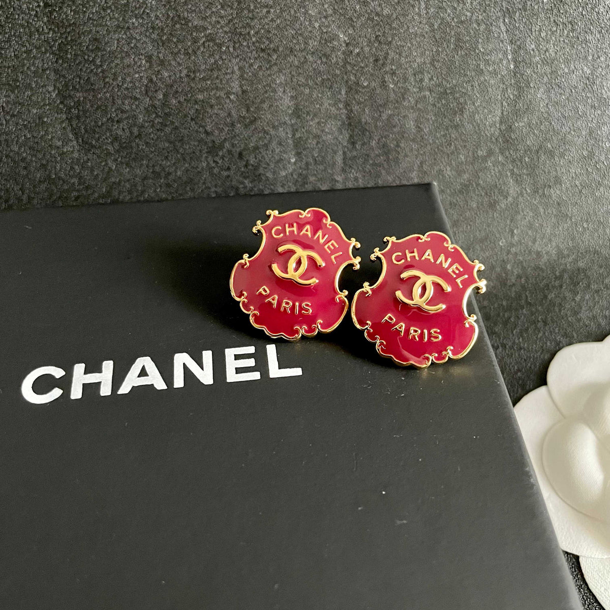 Martin Graham stud earrings in polished metal-tone – detail view