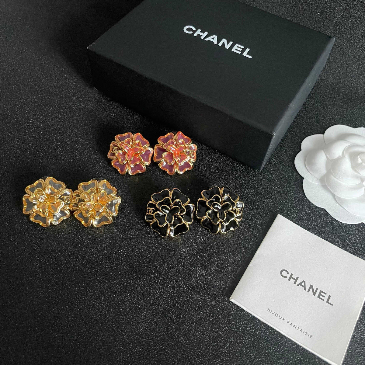 Martin Graham stud earrings in polished metal-tone – close-up detail