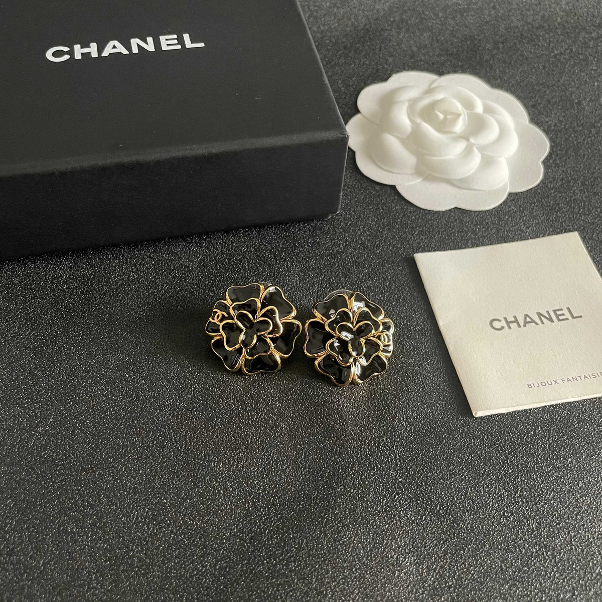 Martin Graham stud earrings in polished metal-tone – styled product view