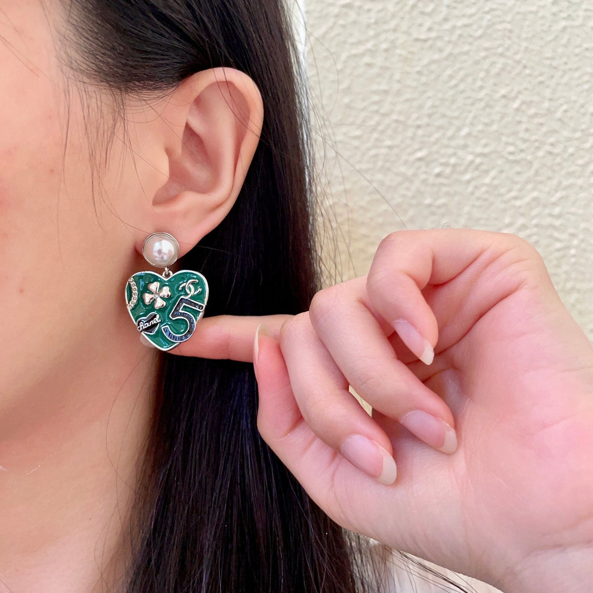Martin Graham earrings in polished metal-tone – front product view