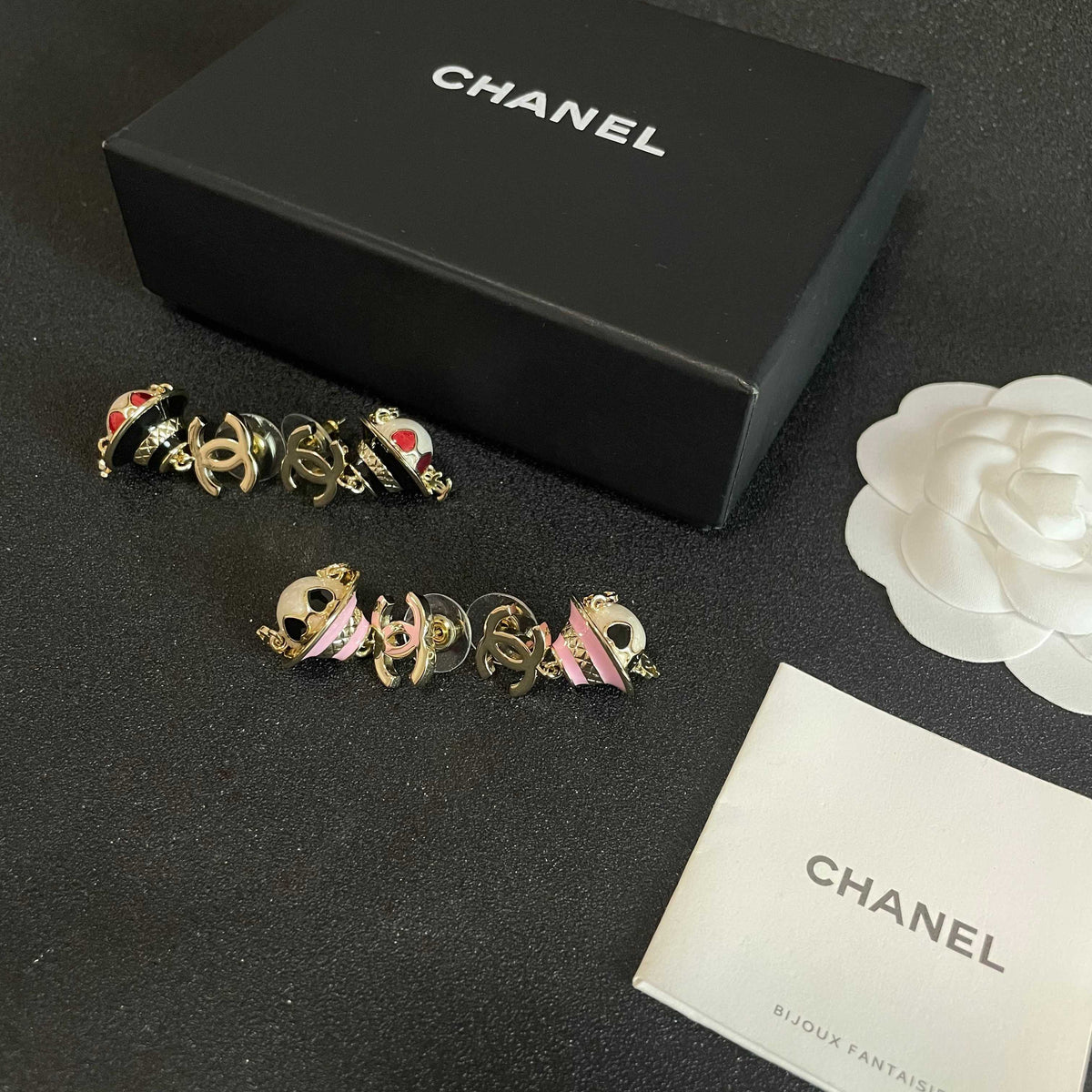 Martin Graham earrings in polished metal-tone – close-up detail
