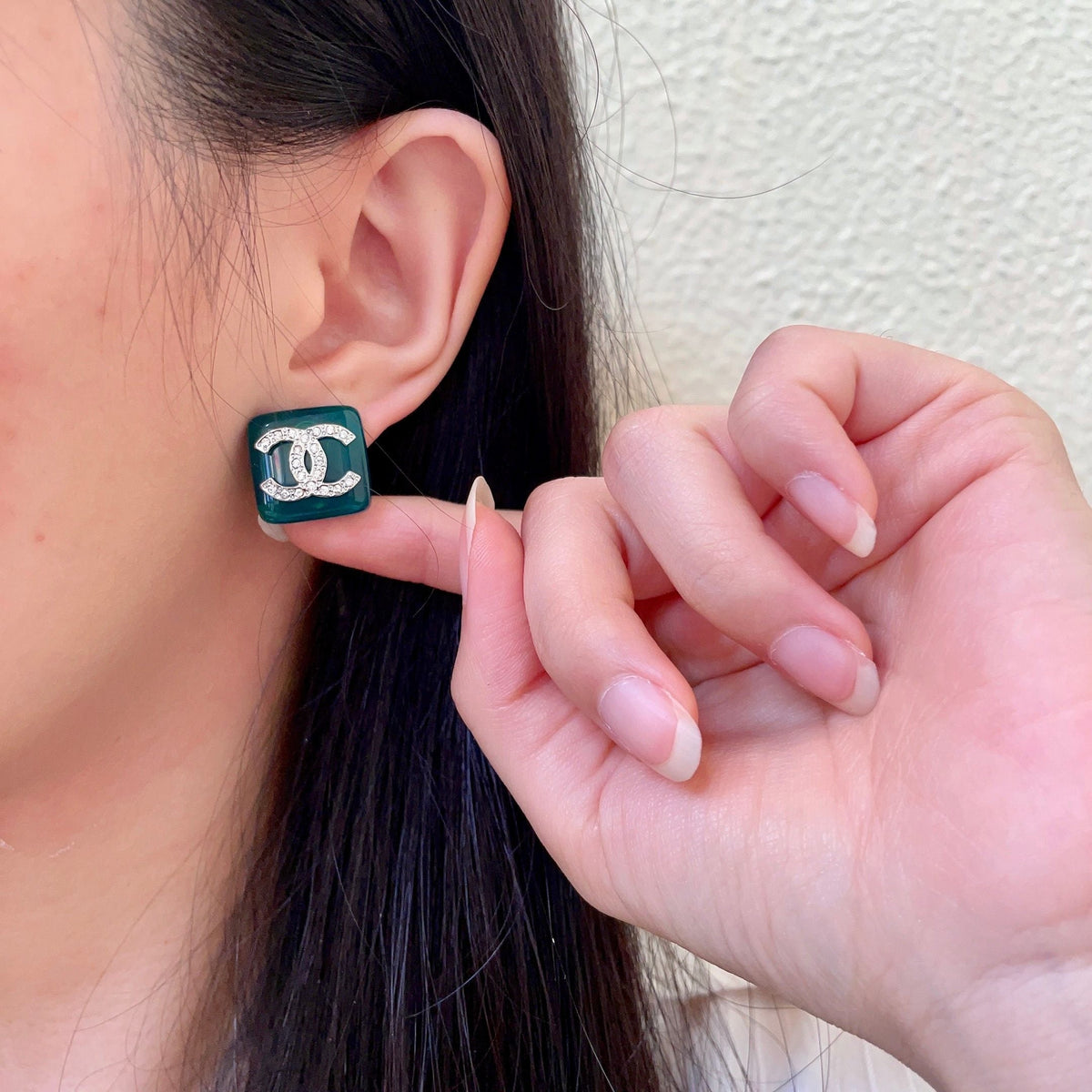Martin Graham stud earrings in polished metal-tone – front product view