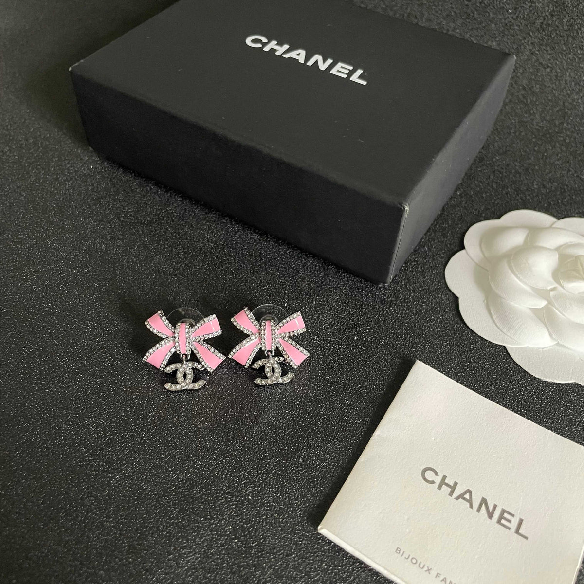 Martin Graham earrings in polished metal-tone – close-up detail