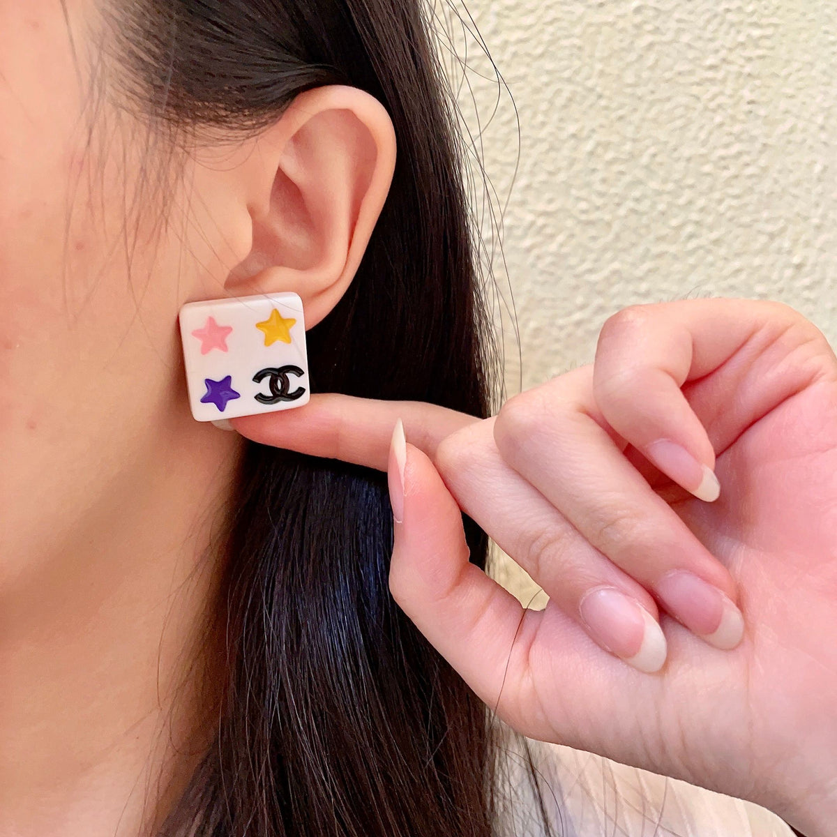 Martin Graham stud earrings in polished metal-tone – front product view