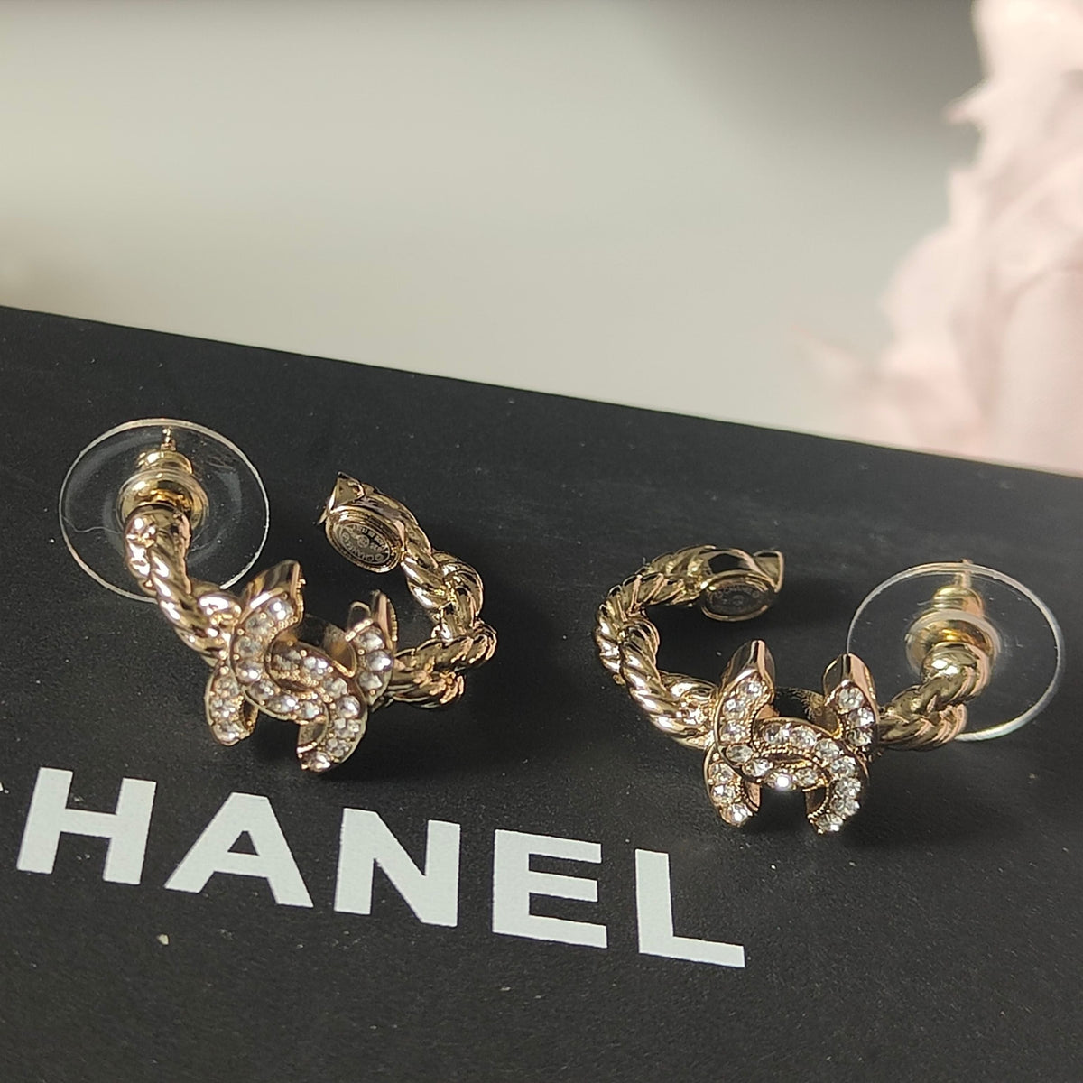 Martin Graham stud earrings in polished metal-tone – side detail