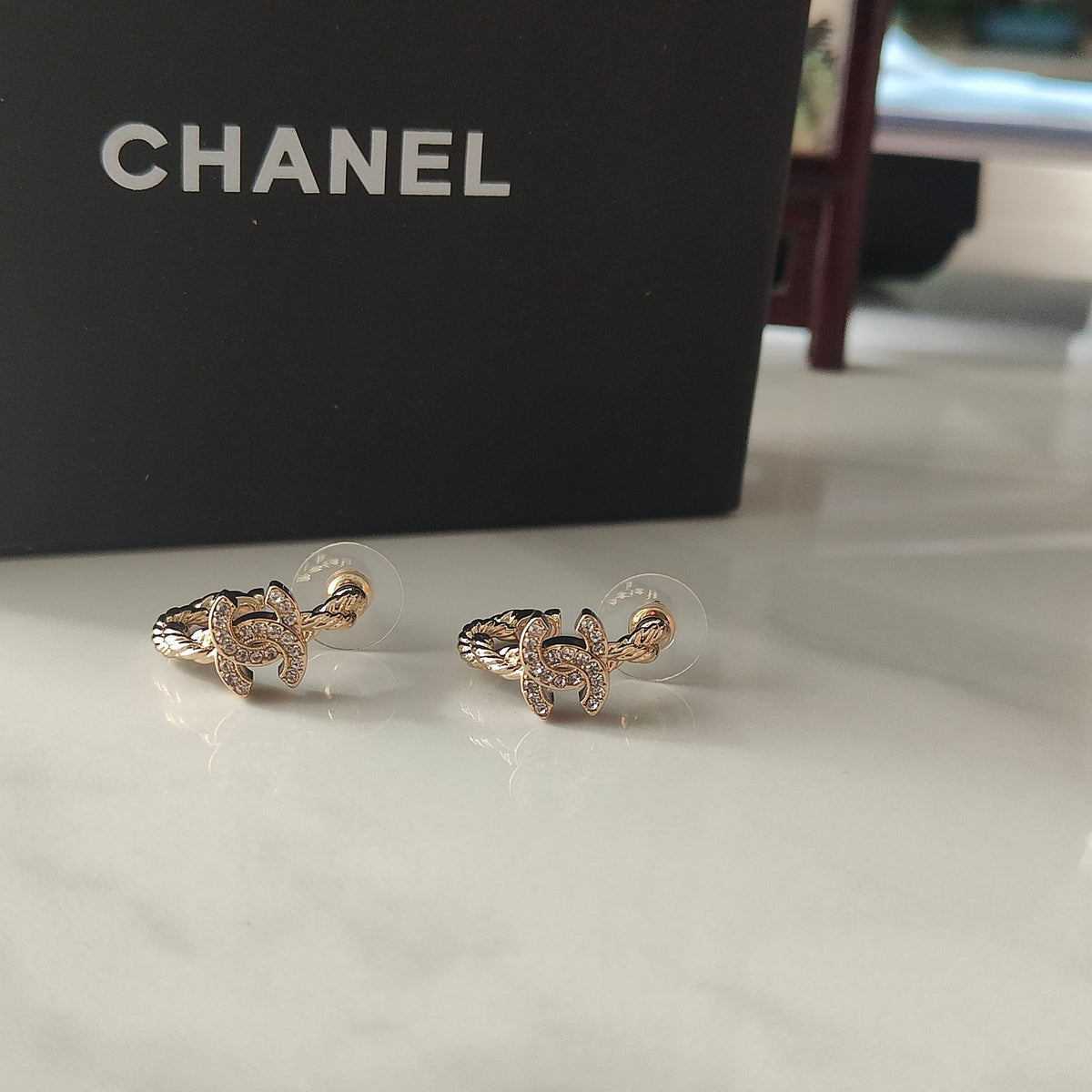 Martin Graham stud earrings in polished metal-tone – main product view