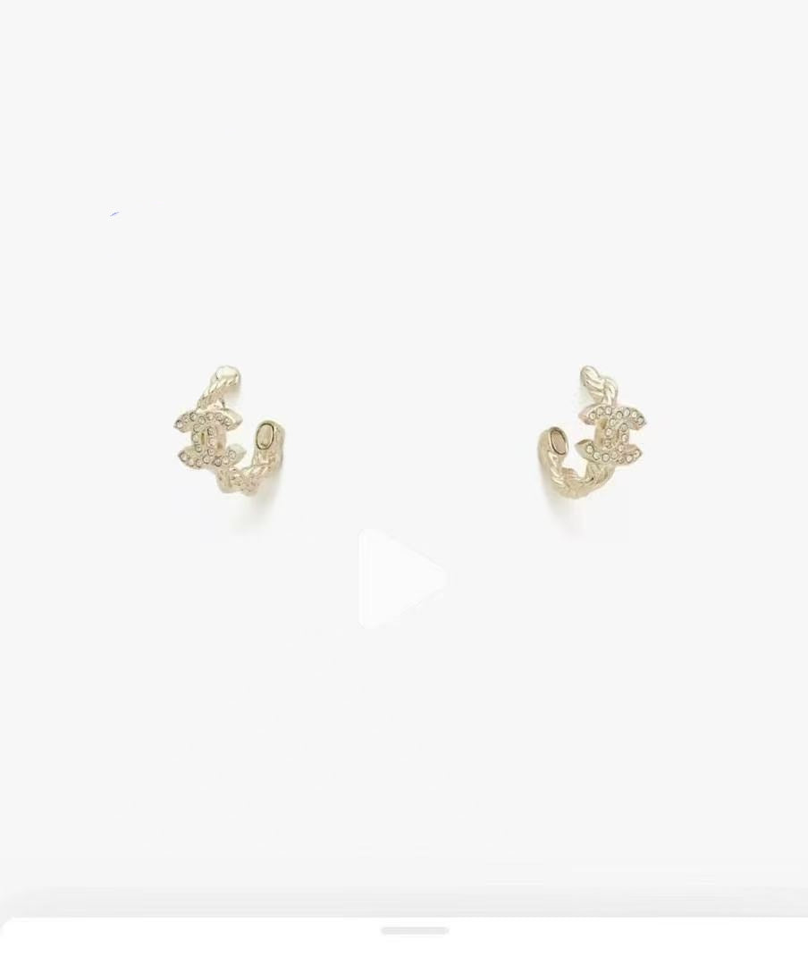 Martin Graham stud earrings in polished metal-tone – close-up detail