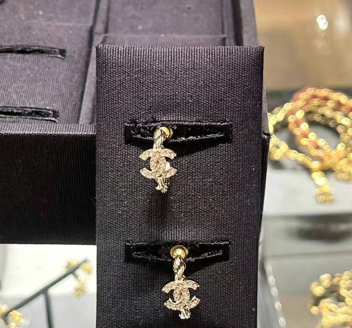 Martin Graham stud earrings in polished metal-tone – front product view