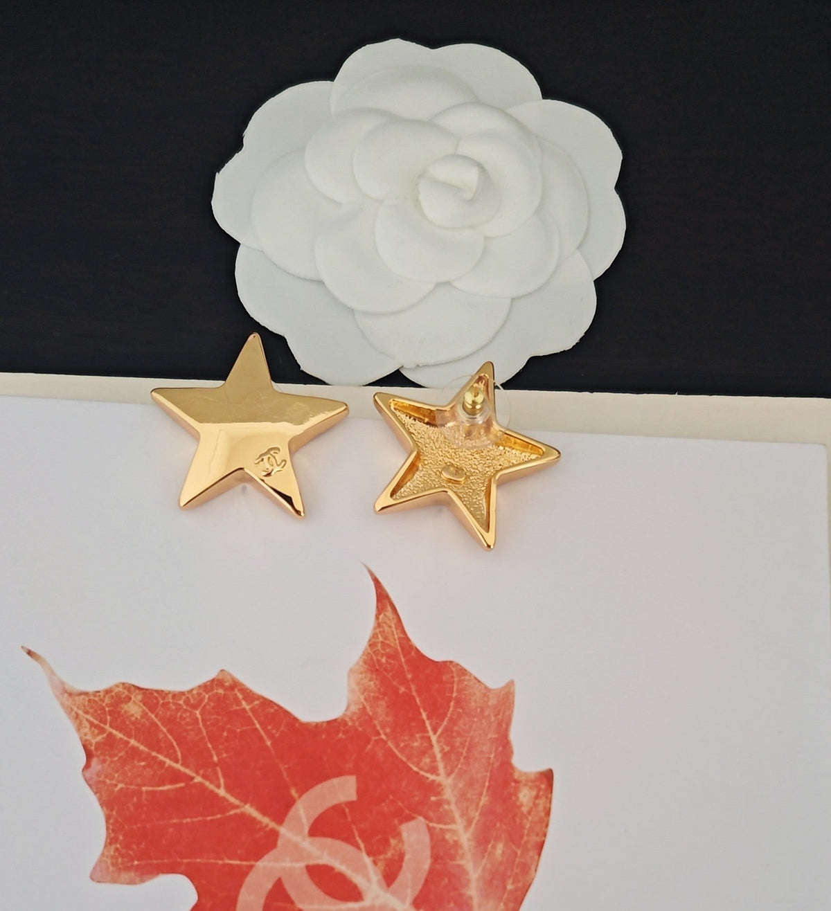 Martin Graham stud earrings in polished metal-tone – front product view