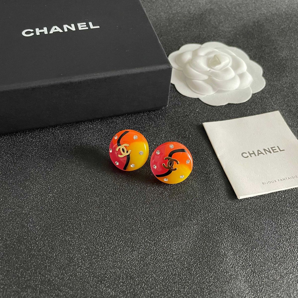 Martin Graham stud earrings in polished metal-tone – styled product view