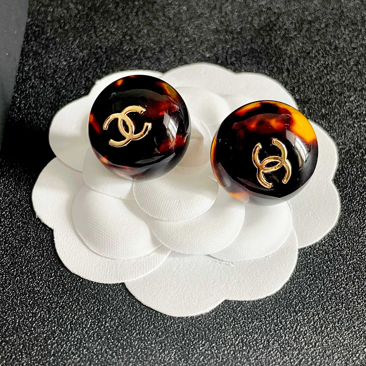 Martin Graham stud earrings in polished metal-tone – front product view