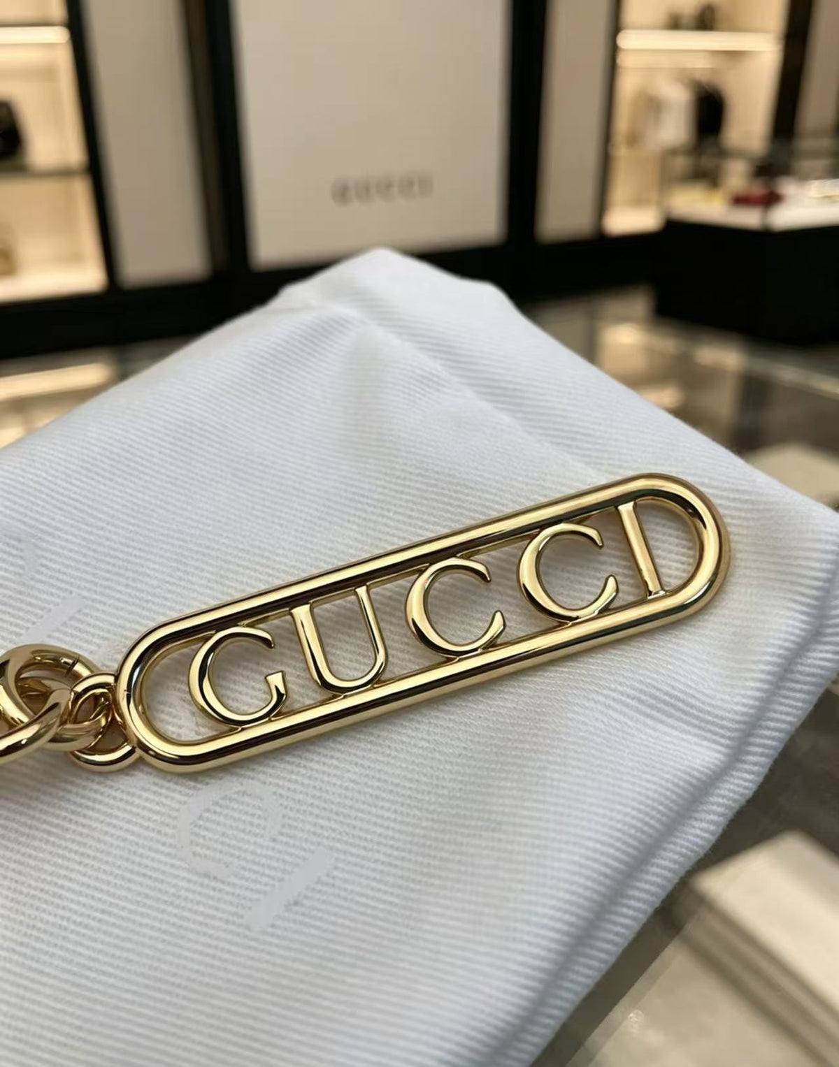 Martin Graham keychain in polished metal-tone – detail view